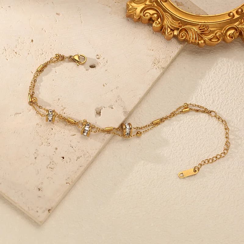 سوار خرزي مطلي بالذهب عيار 18K بحجر زركون صناعي